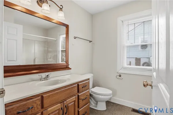 a bathroom with a sink and a toilet