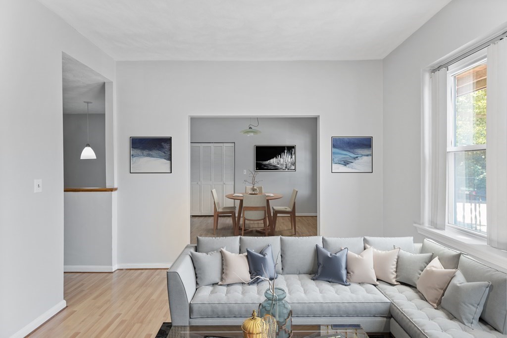 88 Gordon Street, Unit 204 Boston, MA 02135 - Photo 2 of 12 a living room with furniture and a window