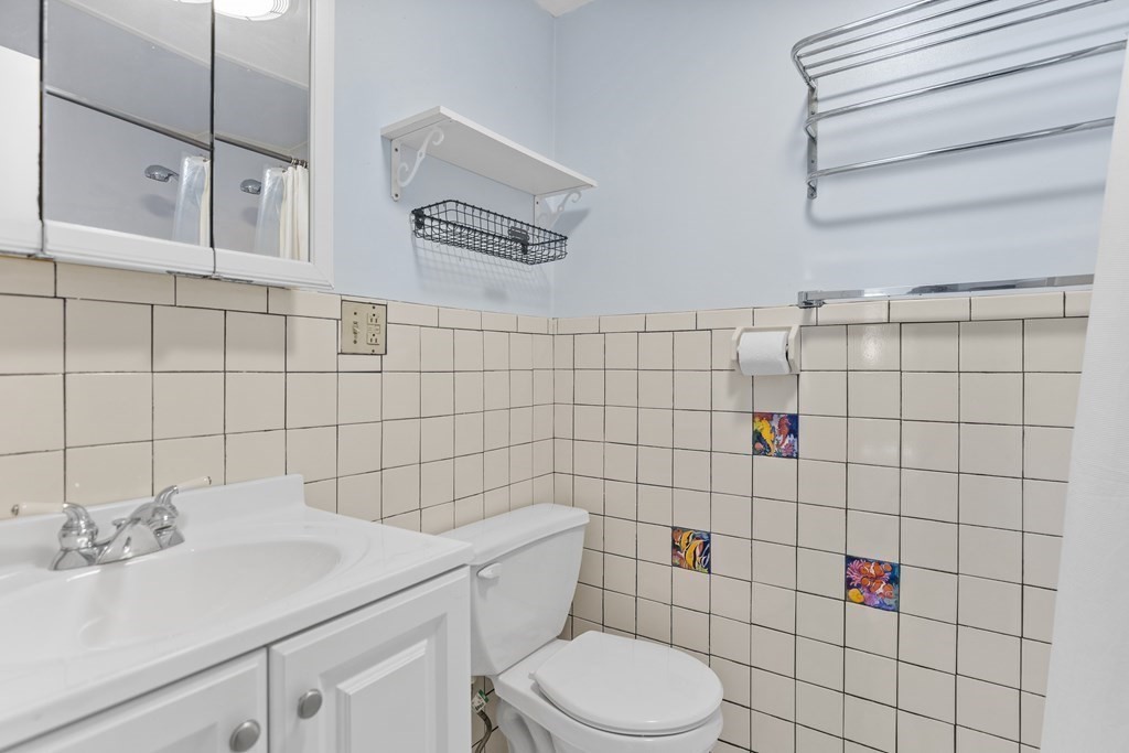 88 Gordon Street, Unit 204 Boston, MA 02135 - Photo 8 of 12 a bathroom with a sink toilet and shower