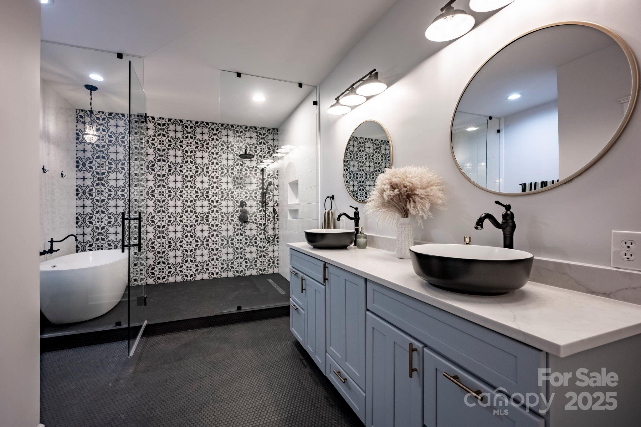 241 Spring Run Road Mooresville, NC 28117 - Photo 14 of 45 a bathroom with a double vanity sink mirror and toilet