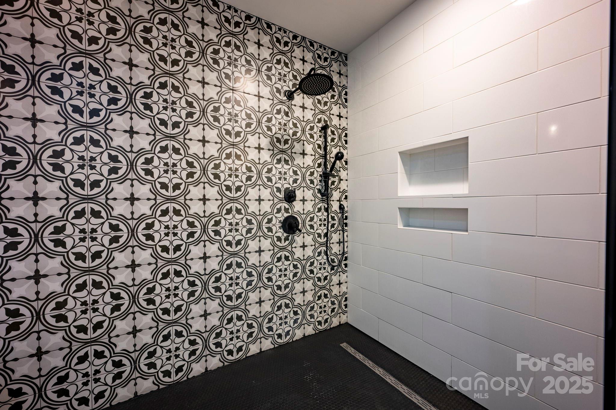 241 Spring Run Road Mooresville, NC 28117 - Photo 16 of 45 a bathroom with a shower curtain