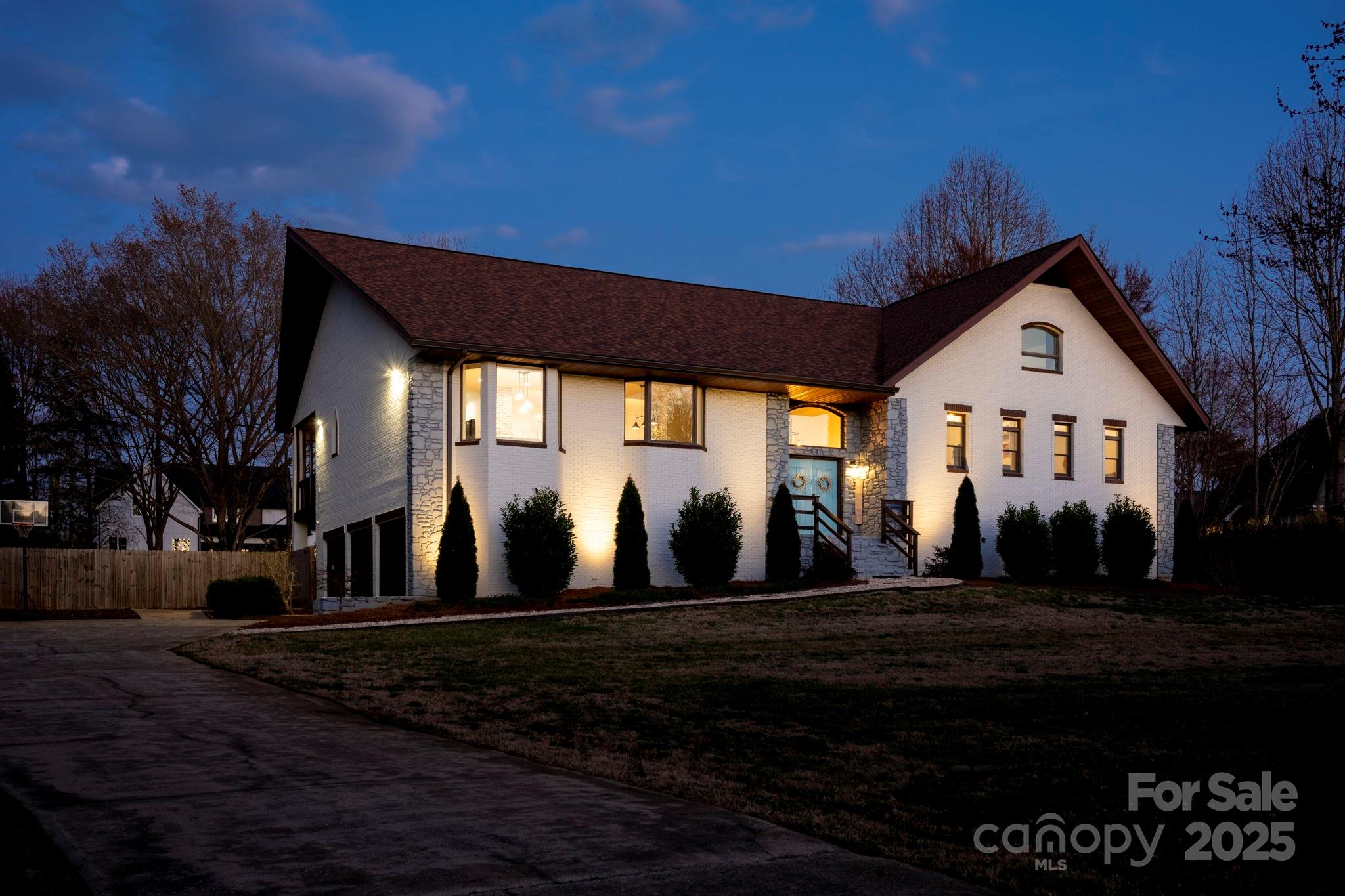 241 Spring Run Road Mooresville, NC 28117 - Photo 2 of 45 a front view of a house with a yard