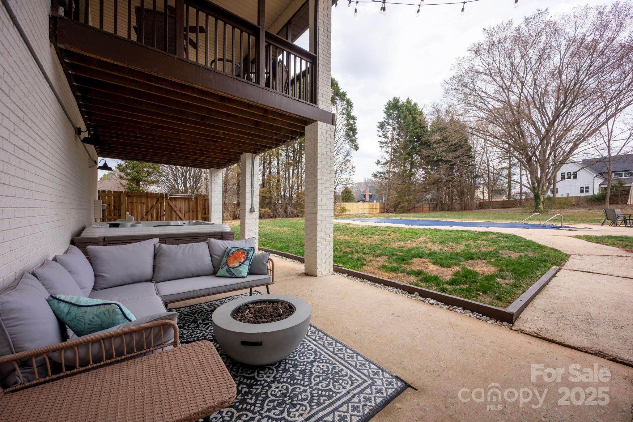 241 Spring Run Road Mooresville, NC 28117 - Photo 35 of 45 a outdoor living space with patio furniture and a garden