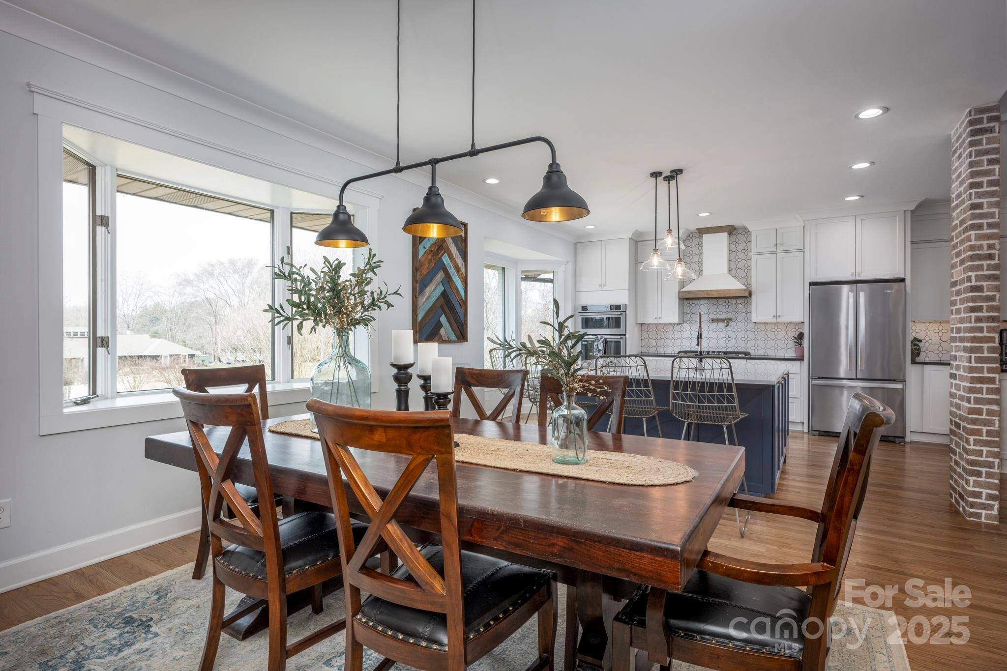 241 Spring Run Road Mooresville, NC 28117 - Photo 8 of 45 a dining room with furniture and window