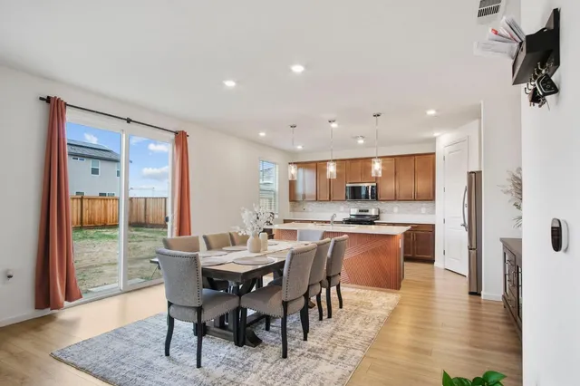 a view of a dining room with furniture