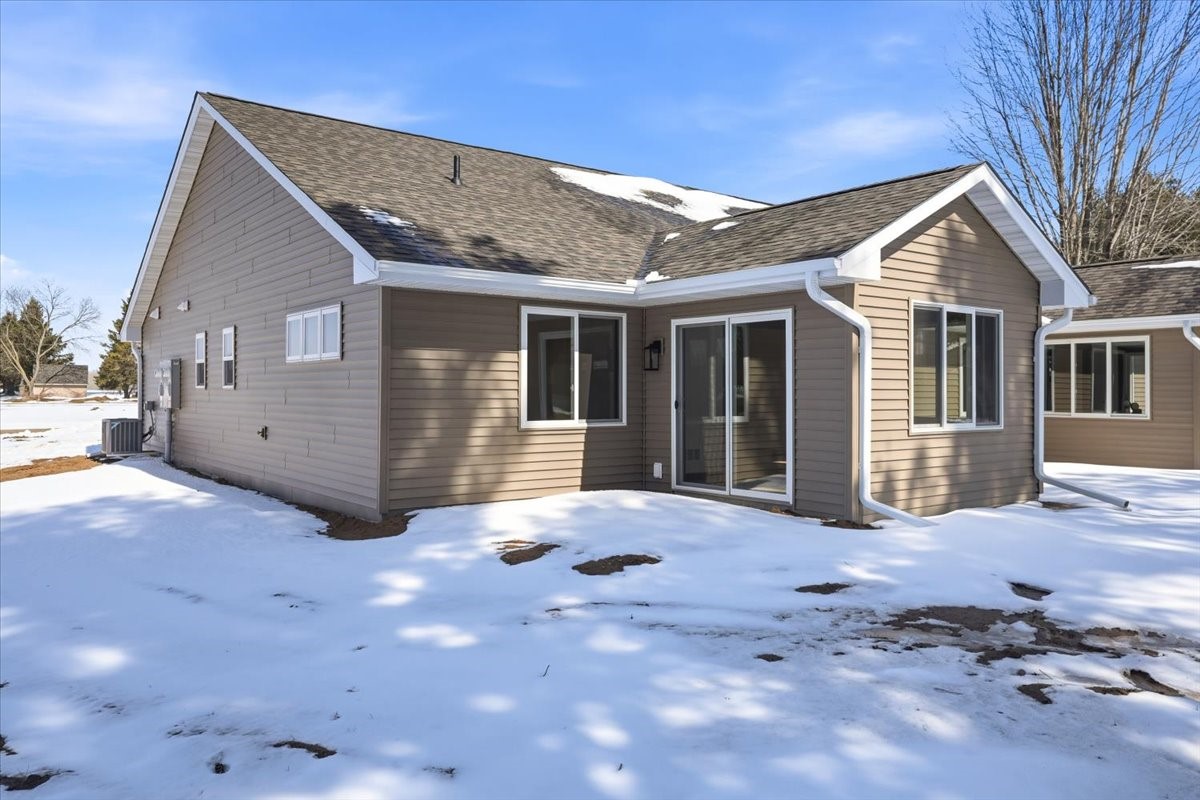 622 Sundance Street Amery, WI 54001 - Photo 17 of 24 Back patio / yard access.