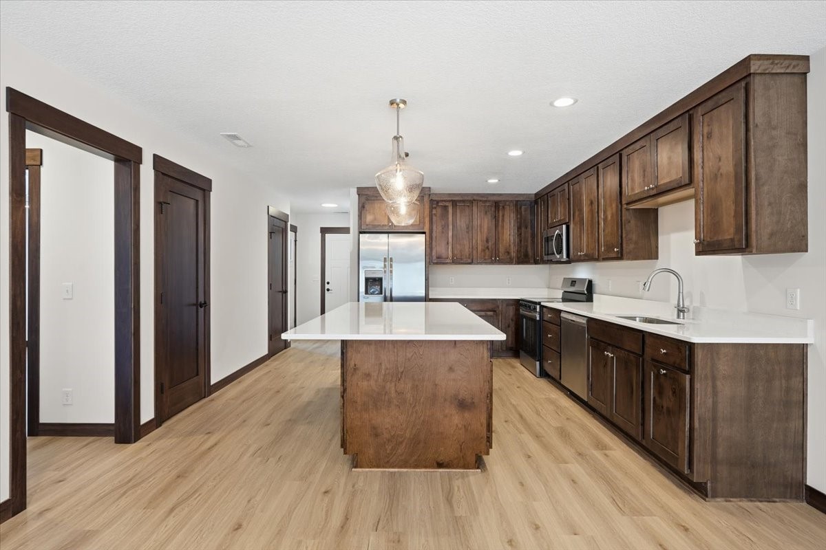622 Sundance Street Amery, WI 54001 - Photo 6 of 24 Additional seating at the spacious island.