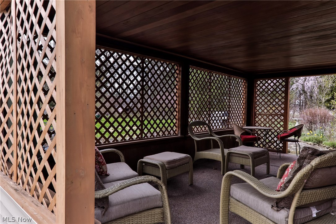 1798 Center Road Avon, OH 44011 - Photo 4 of 30 Roofed and lattice patio to enjoy the nice evenings.