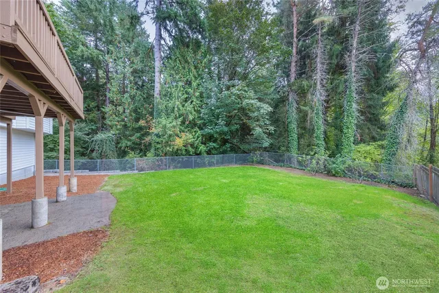 a view of a yard with a trees