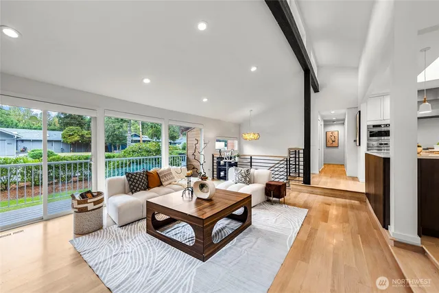 a living room with furniture and a table