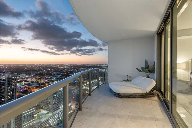 a view of a patio with swimming pool