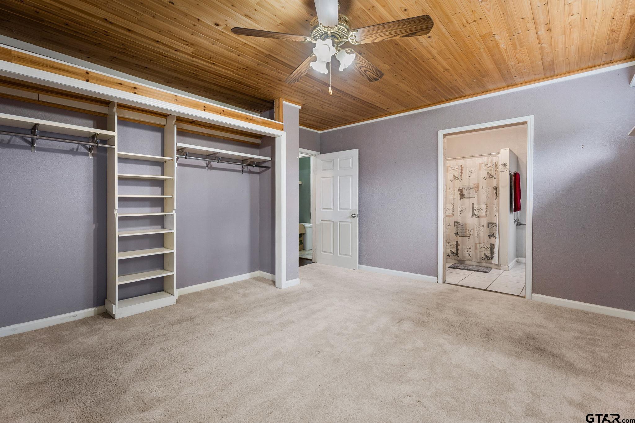 6091 Mockingbird Lane Murchison, TX 75778 - Photo 11 of 33 a view of an empty room with a ceiling fan