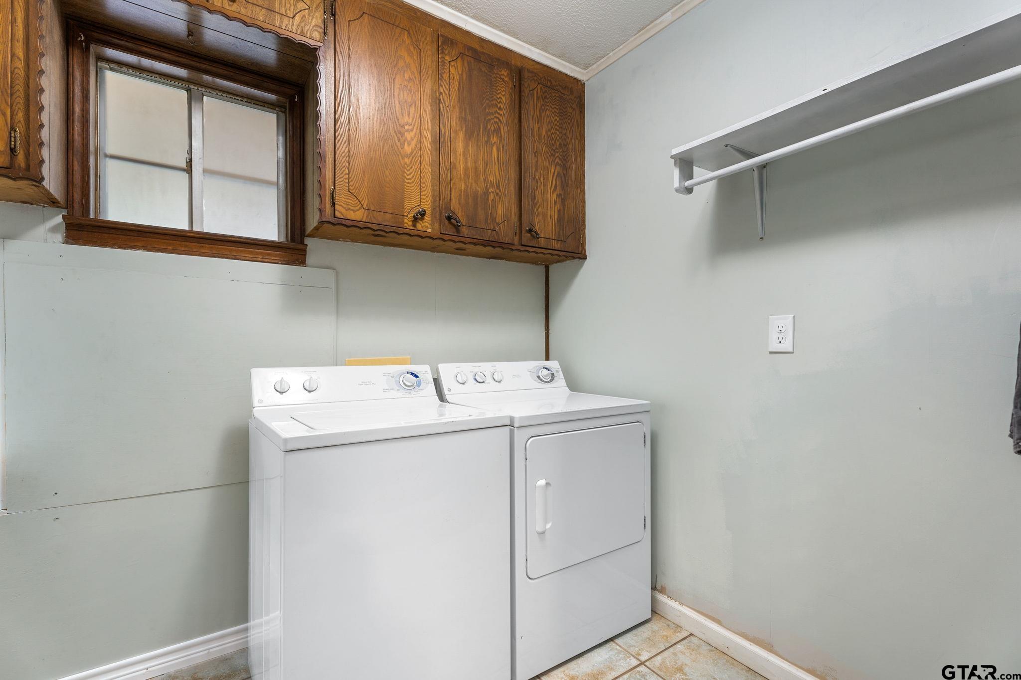 6091 Mockingbird Lane Murchison, TX 75778 - Photo 16 of 33 a utility room with dryer and washer