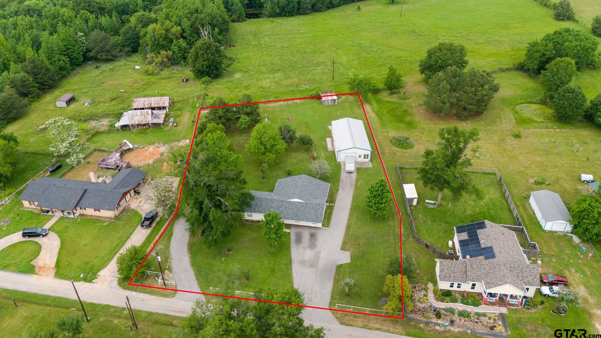 6091 Mockingbird Lane Murchison, TX 75778 - Photo 2 of 33 an aerial view of a houses with swimming pool