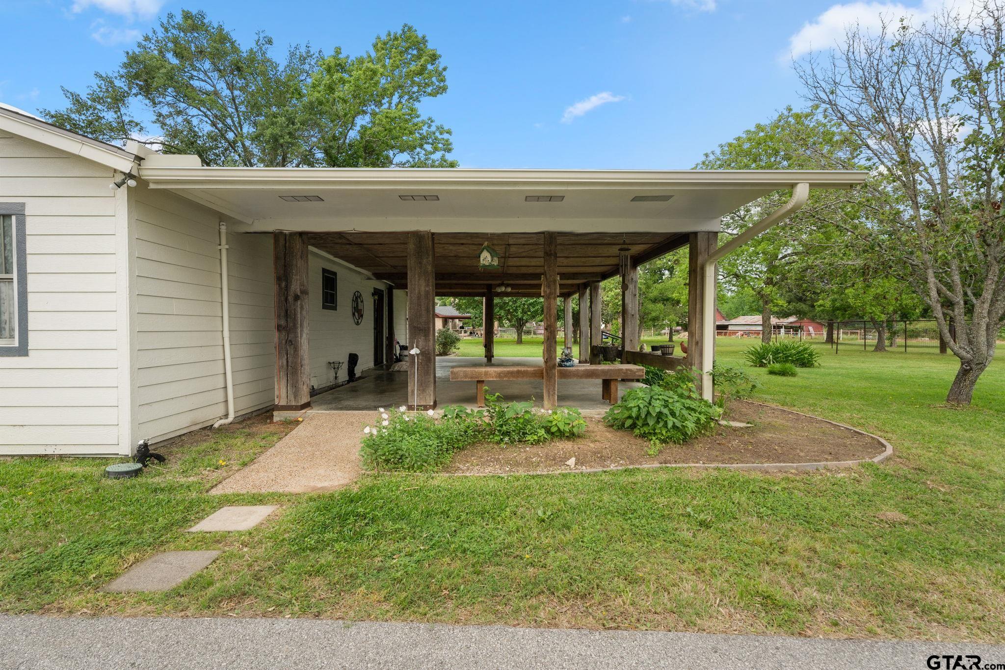 6091 Mockingbird Lane Murchison, TX 75778 - Photo 25 of 33 a view of a back yard of the house