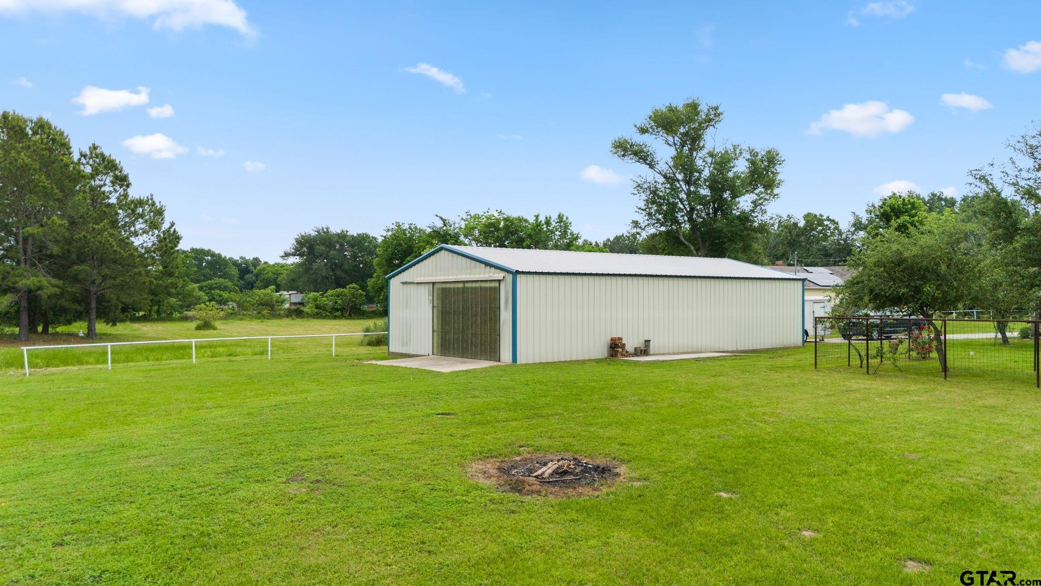 6091 Mockingbird Lane Murchison, TX 75778 - Photo 30 of 33 a view of a house with a backyard