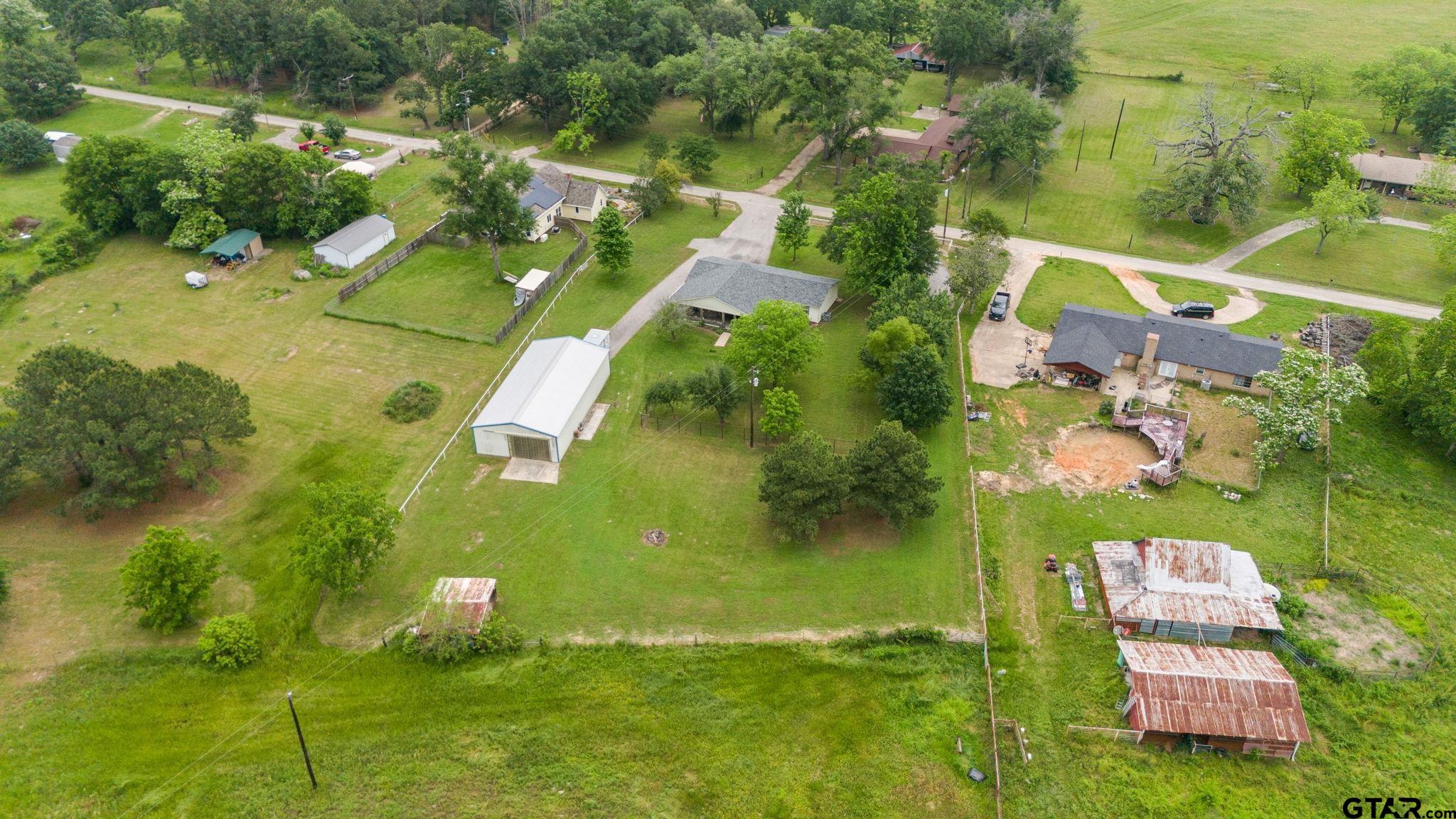 6091 Mockingbird Lane Murchison, TX 75778 - Photo 31 of 33 an aerial view of residential house with outdoor space and trees all around
