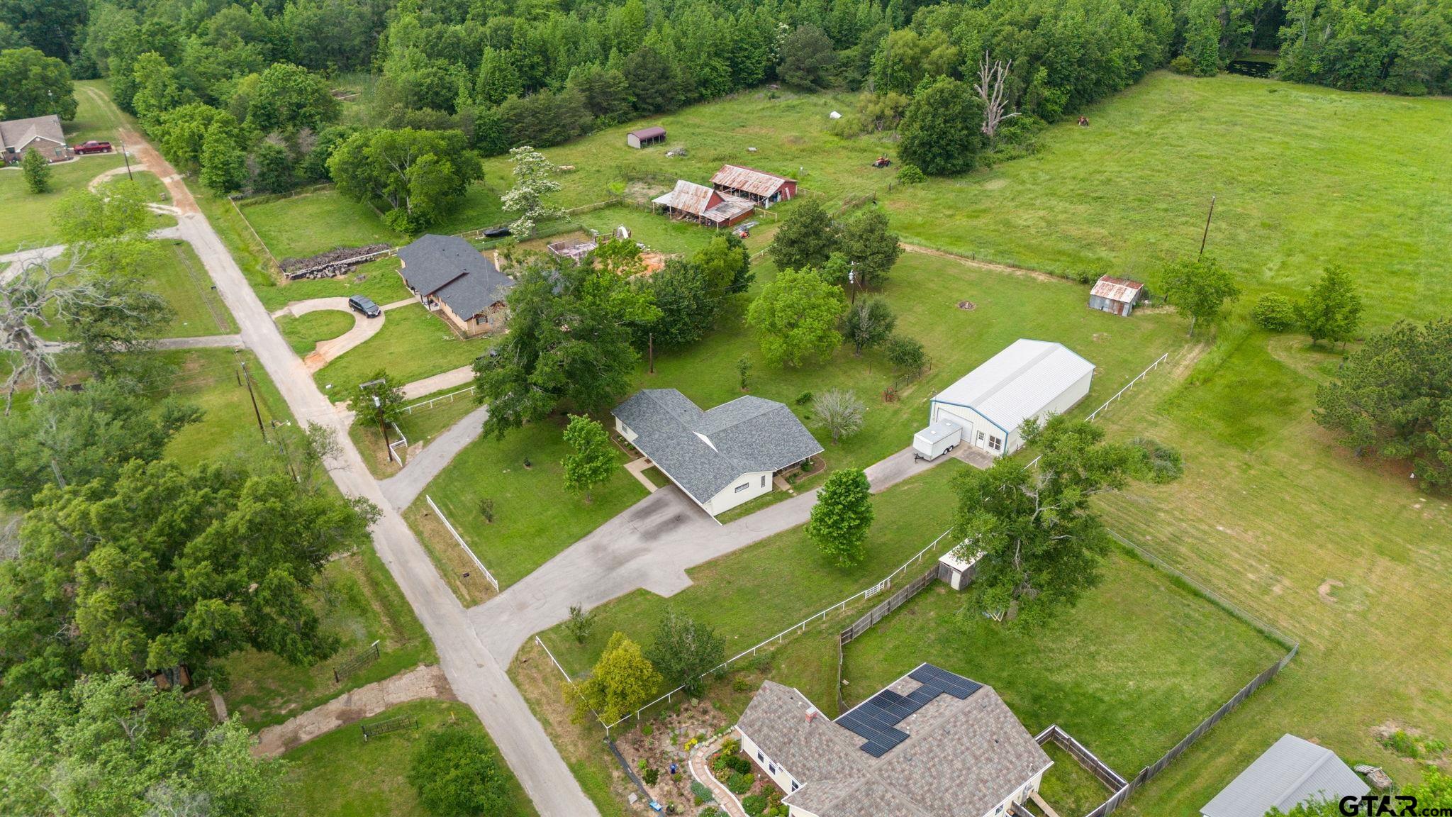 6091 Mockingbird Lane Murchison, TX 75778 - Photo 32 of 33 an aerial view of a house yard swimming pool and outdoor seating