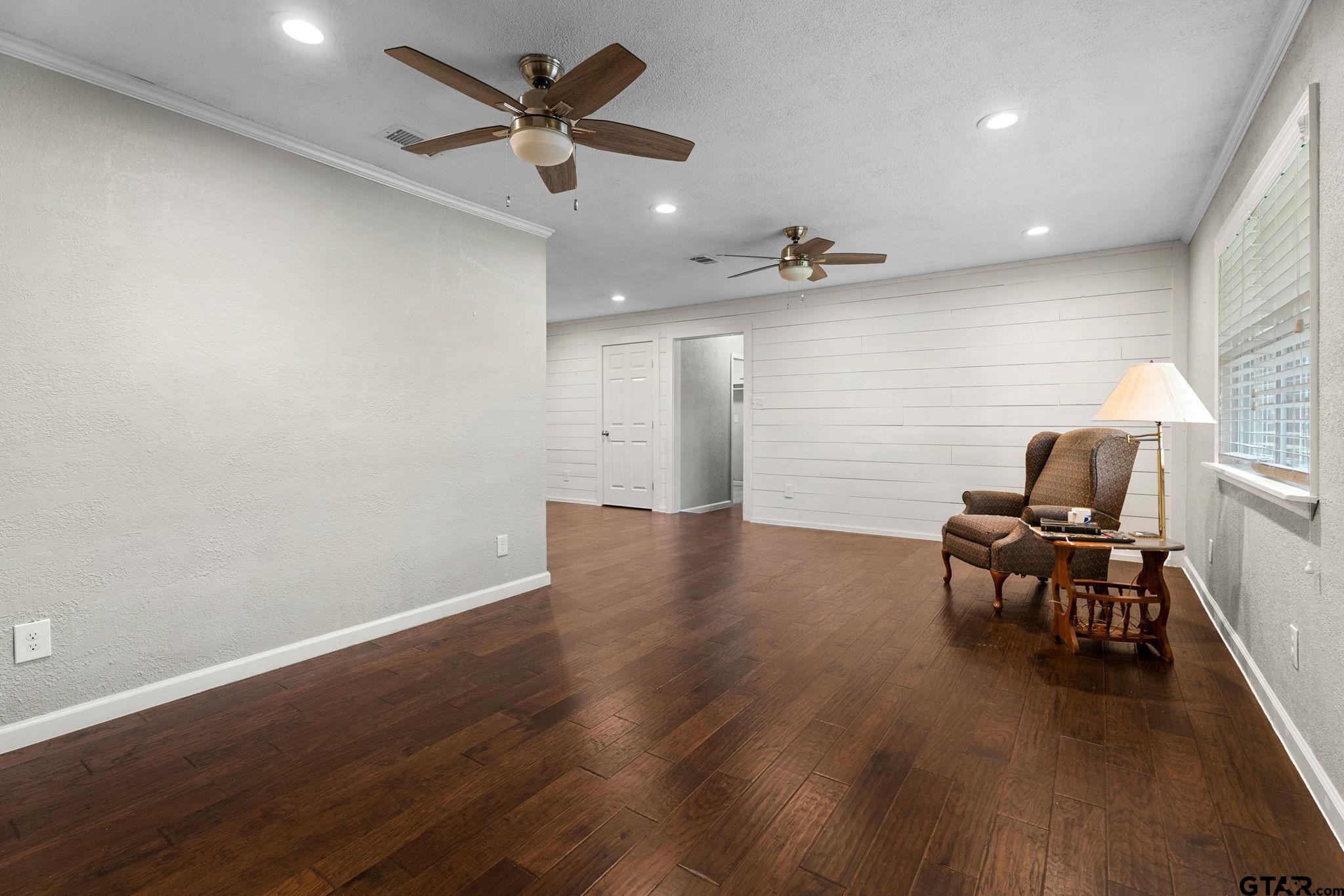 6091 Mockingbird Lane Murchison, TX 75778 - Photo 4 of 33 a view of a livingroom with furniture and wooden floor