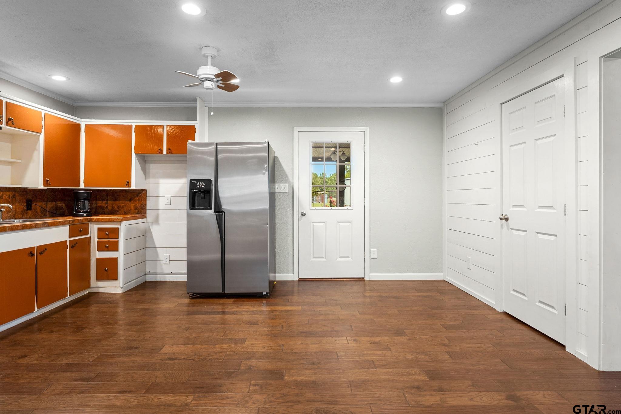 6091 Mockingbird Lane Murchison, TX 75778 - Photo 9 of 33 a kitchen with stainless steel appliances a refrigerator and cabinets