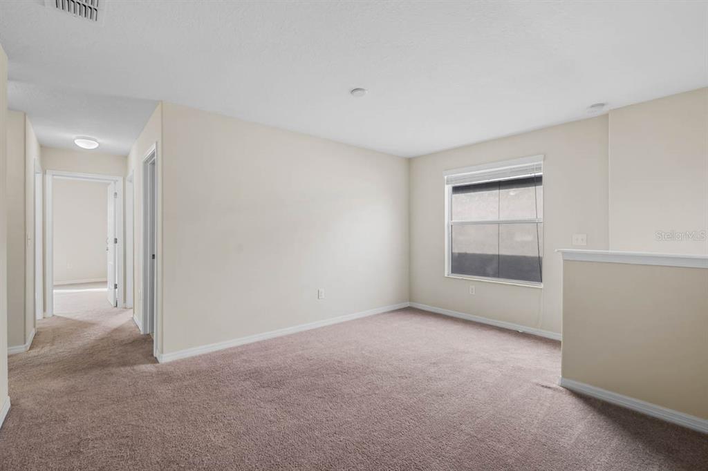 1504 Oak Pond Street Ruskin, FL 33570 - Photo 22 of 76 a view of an empty room with a window