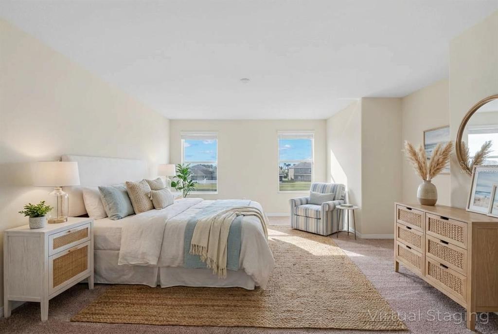 1504 Oak Pond Street Ruskin, FL 33570 - Photo 23 of 76 a bedroom with furniture and a dresser