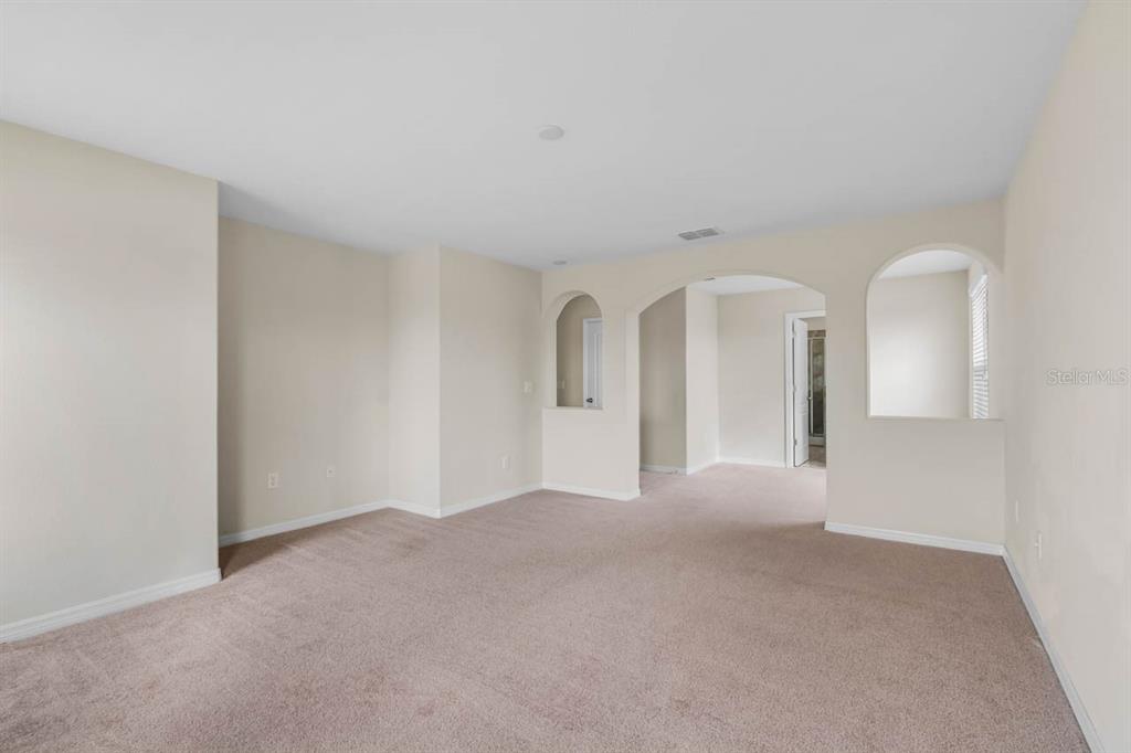 1504 Oak Pond Street Ruskin, FL 33570 - Photo 26 of 76 a view of a big room with closet and windows