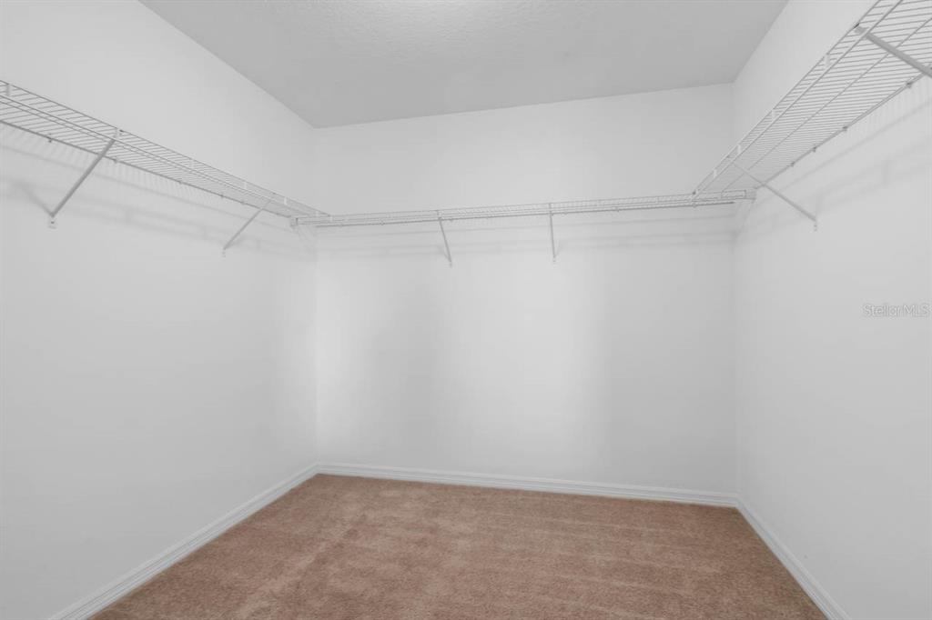 1504 Oak Pond Street Ruskin, FL 33570 - Photo 27 of 76 a view of a room with shelf on the wall