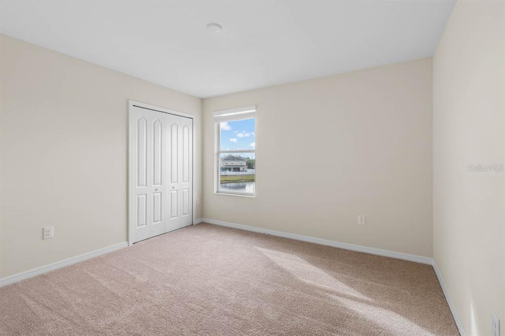 1504 Oak Pond Street Ruskin, FL 33570 - Photo 39 of 76 a view of an empty room with a window
