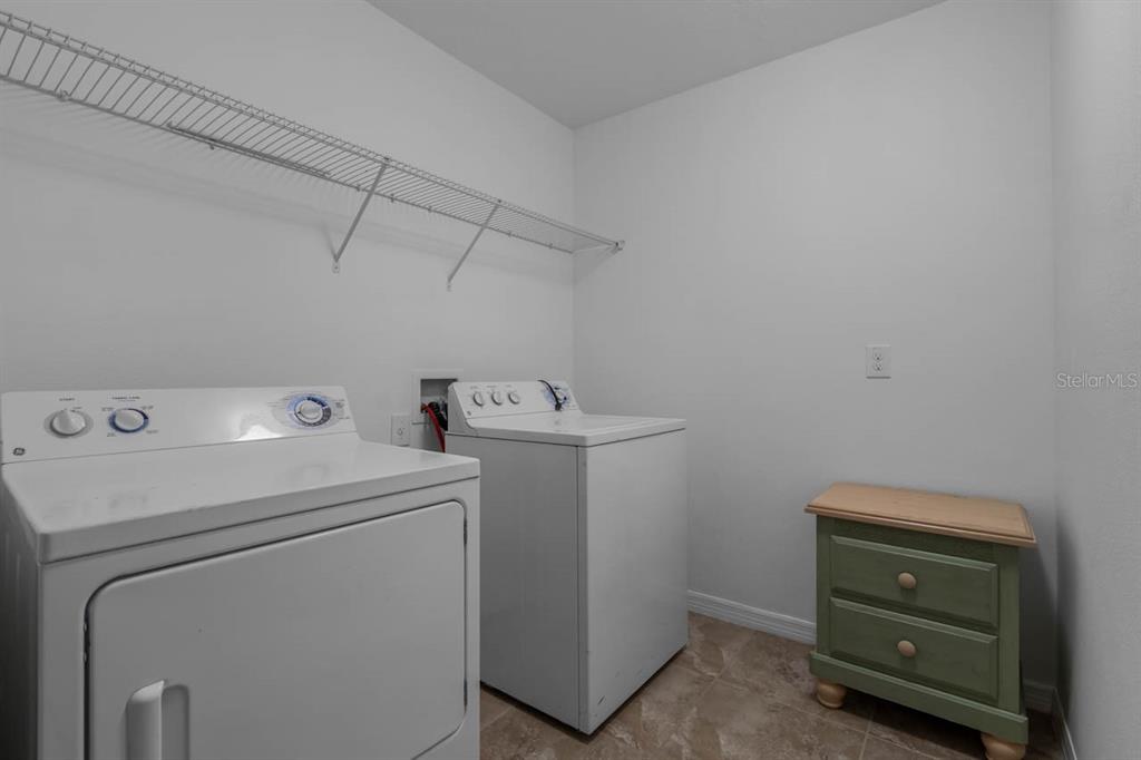 1504 Oak Pond Street Ruskin, FL 33570 - Photo 41 of 76 a utility room with dryer and washer