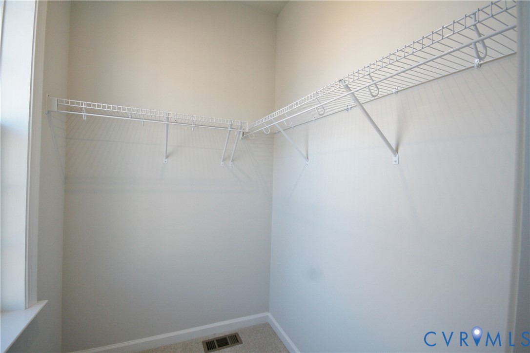 13226 Coalfield Station Lane Midlothian, VA 23114 - Photo 11 of 35 a view of a room with racks on the wall