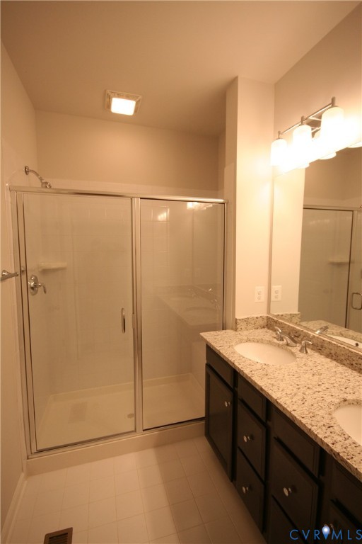 13226 Coalfield Station Lane Midlothian, VA 23114 - Photo 14 of 35 a bathroom with a granite countertop sink and a mirror
