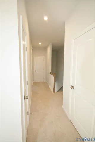 a view of a room with a hallway
