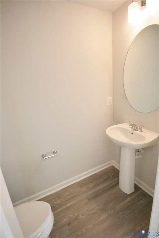 13226 Coalfield Station Lane Midlothian, VA 23114 - Photo 24 of 35 a bathroom with a sink toilet and a mirror
