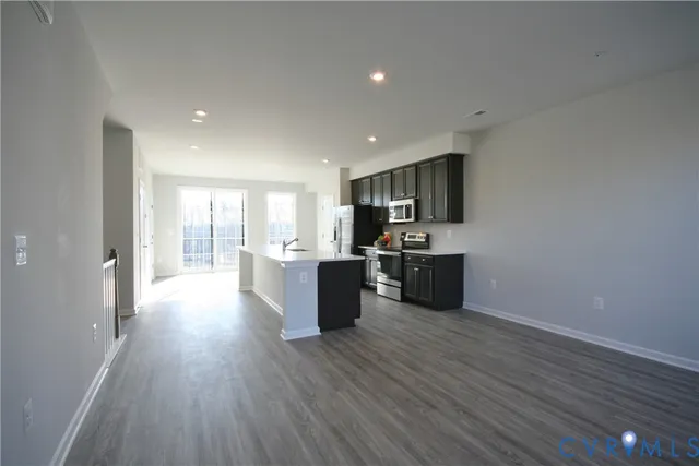 a view of kitchen with wooden floor