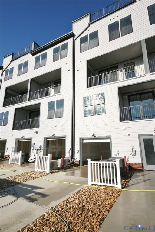 13226 Coalfield Station Lane Midlothian, VA 23114 - Photo 33 of 35 a front view of a building with glass windows