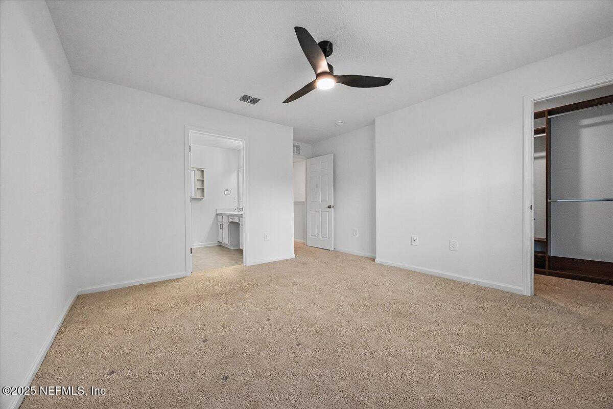 48 Barley Street St. Augustine, FL 32092 - Photo 12 of 24 a view of an empty room with a ceiling fan