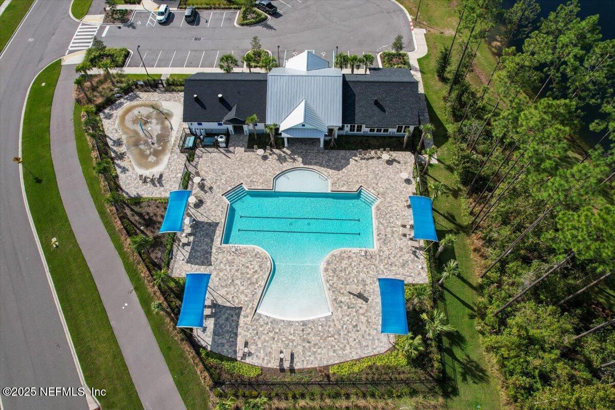 48 Barley Street St. Augustine, FL 32092 - Photo 22 of 24 an aerial view of a house with garden space and outdoor seating