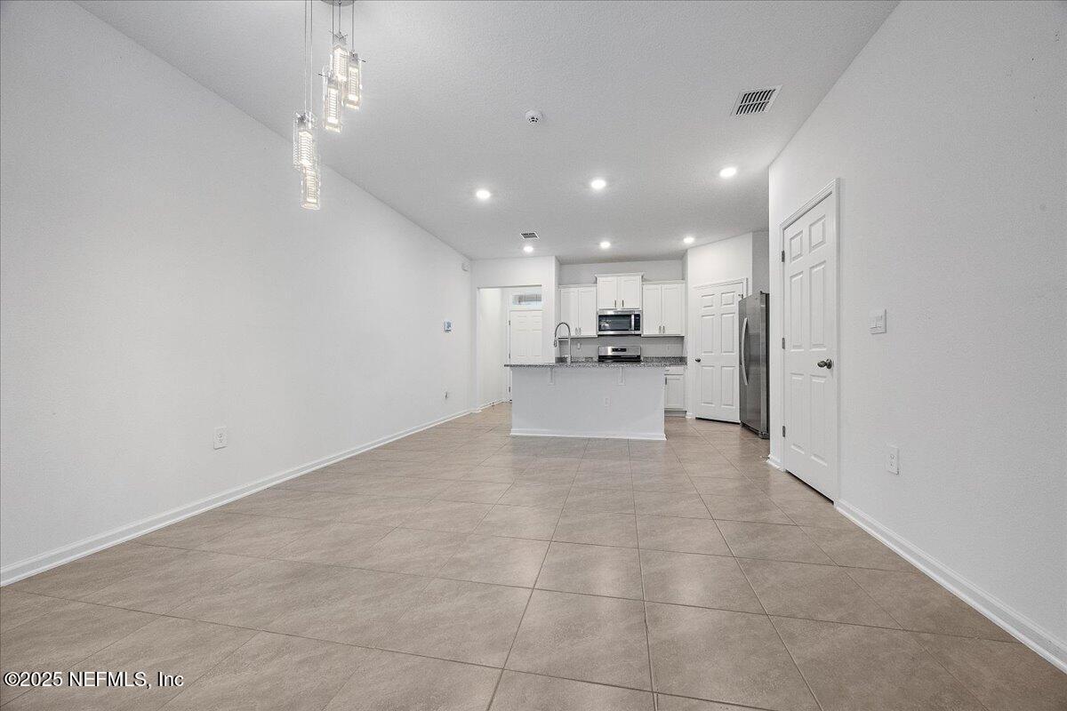 48 Barley Street St. Augustine, FL 32092 - Photo 3 of 24 a view of a kitchen with a sink and cabinets