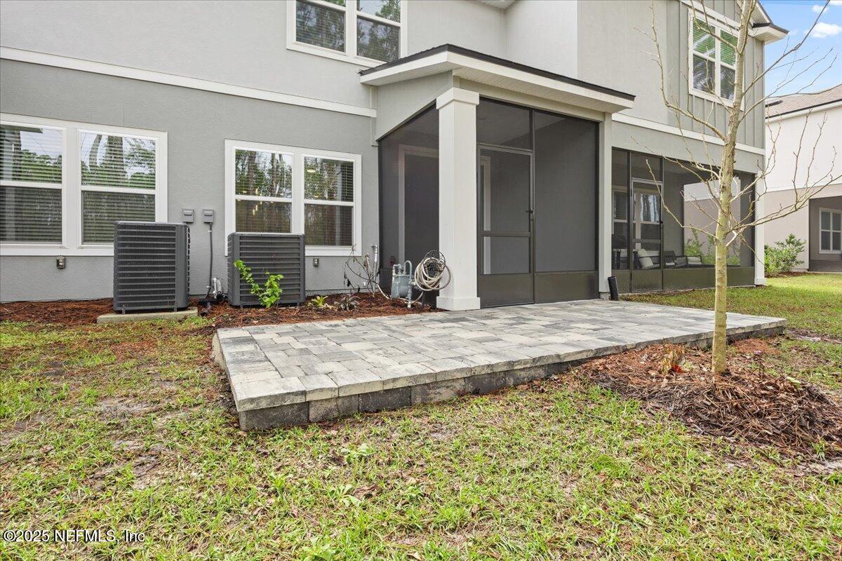 48 Barley Street St. Augustine, FL 32092 - Photo 10 of 24 a view of a house with a backyard