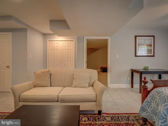 a living room with furniture and a couch
