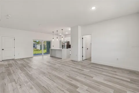 a view of a livingroom with wooden floor