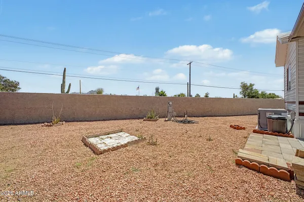 a view of a back yard of the house