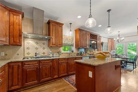 a kitchen with lots of counter space and a sink