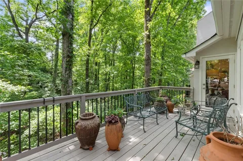 a view of roof deck with furniture