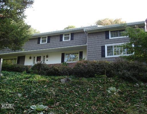2 Peaceable Hill Road Ridgefield, CT 06877 - Photo 1 of 1 a front view of house with a yard