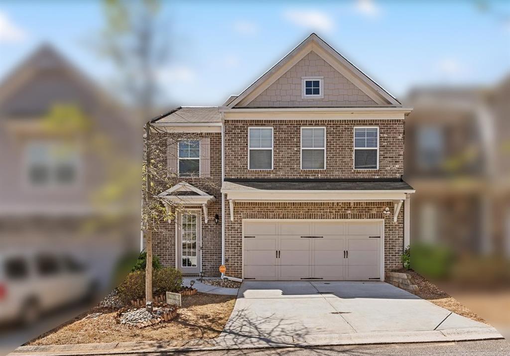 5822 Keystone Point Lithonia, GA 30058 - Photo 1 of 1 a front view of a house with a yard