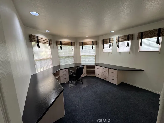 a room with furniture and window