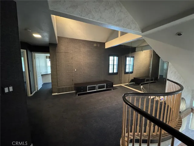 a view of a hallway with workspace