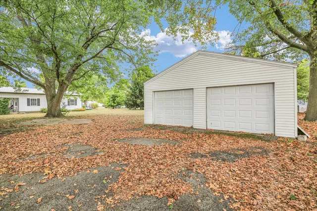 a house with a tree in front of it